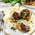 square image of turkey meatballs with gravy.
