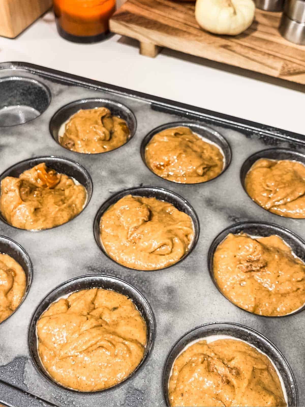 batter in muffin tins. 