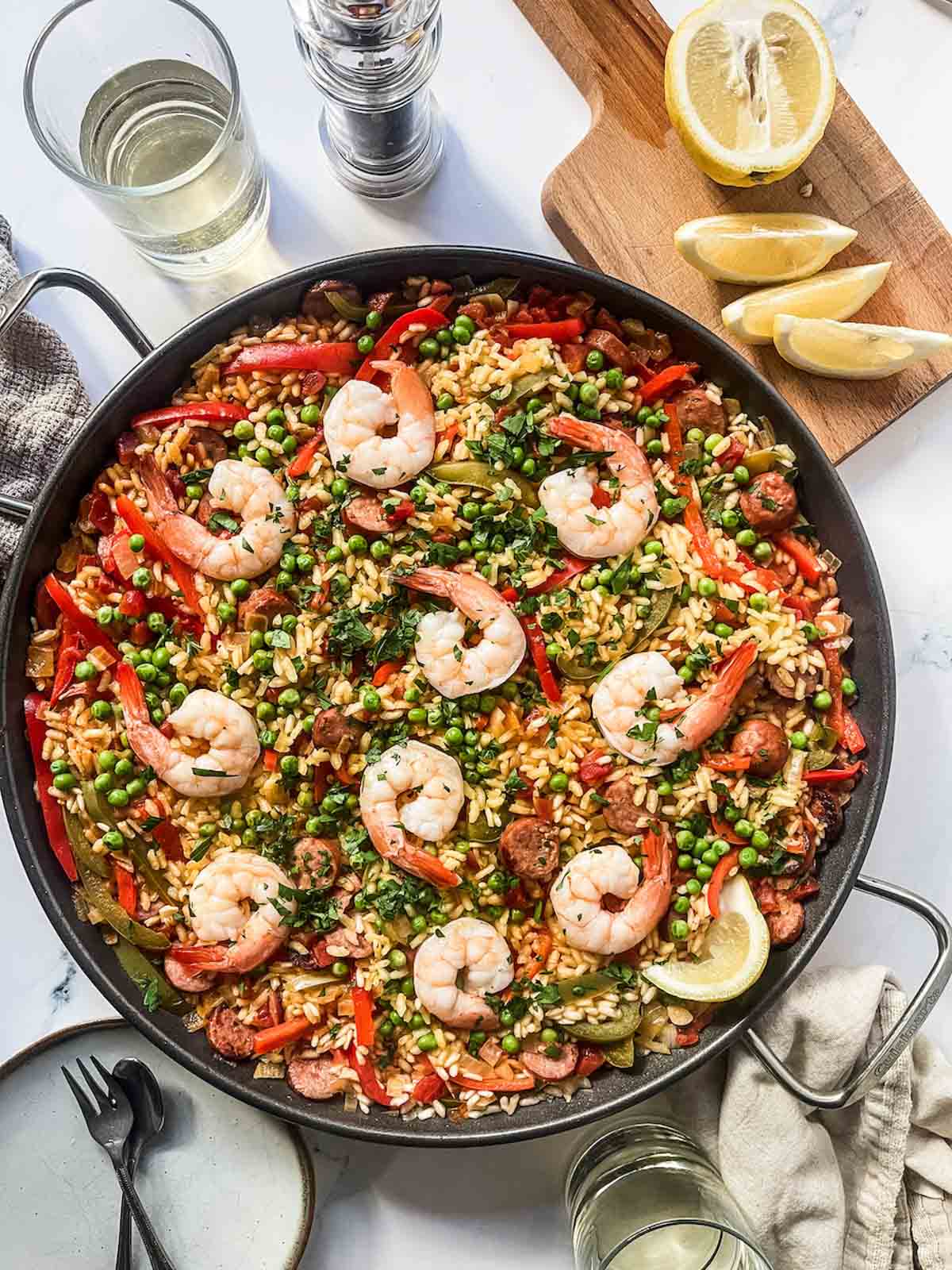 sausage and shrimp paella plated.