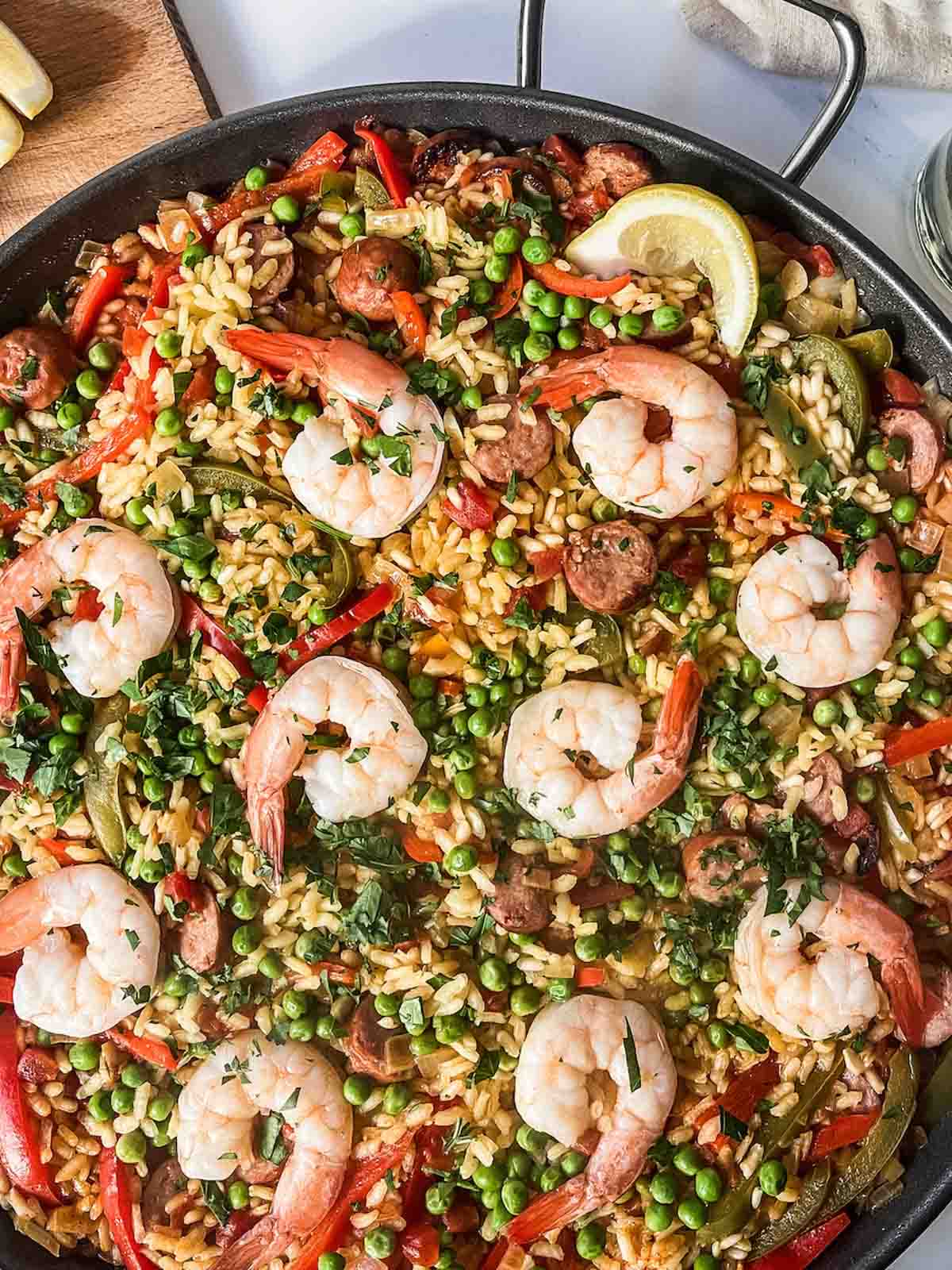sausage and shrimp paella being made. 