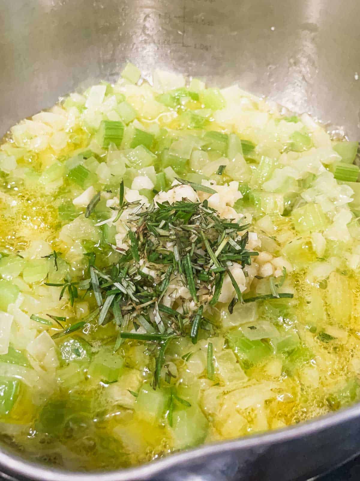 rosemary and garlic added to pan.
