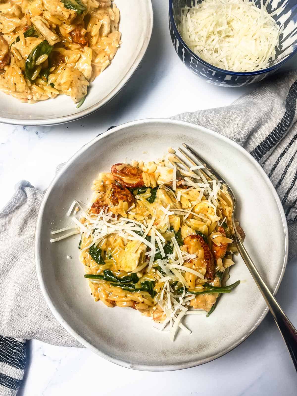 Chicken Orzo Pasta Bake with a fork.
