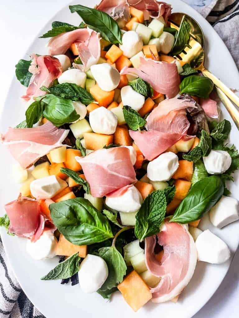 Prosciutto and Melon on a plate served.