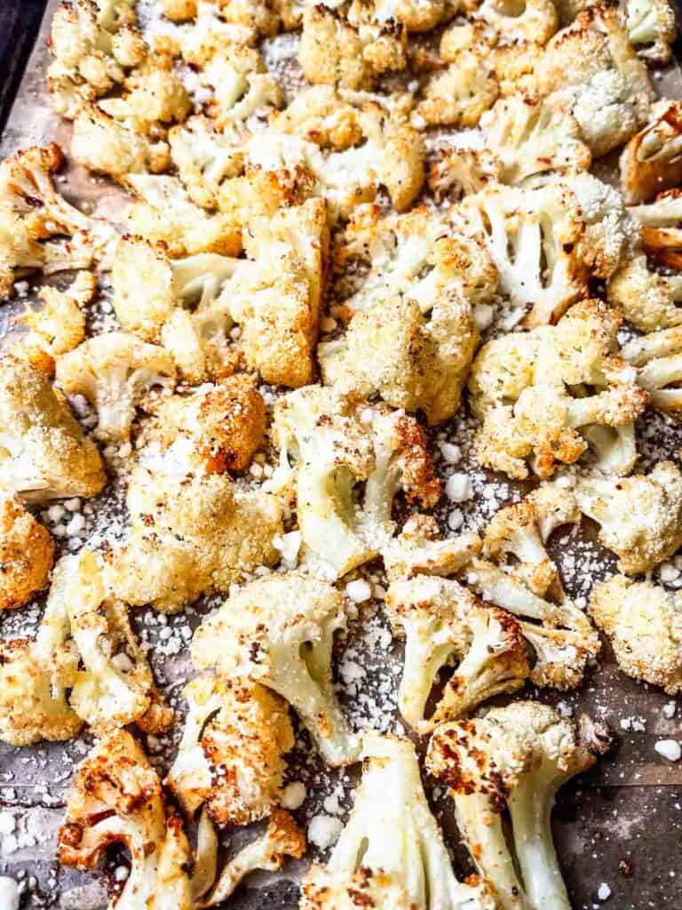 Parmesan cheese added to cauliflower.