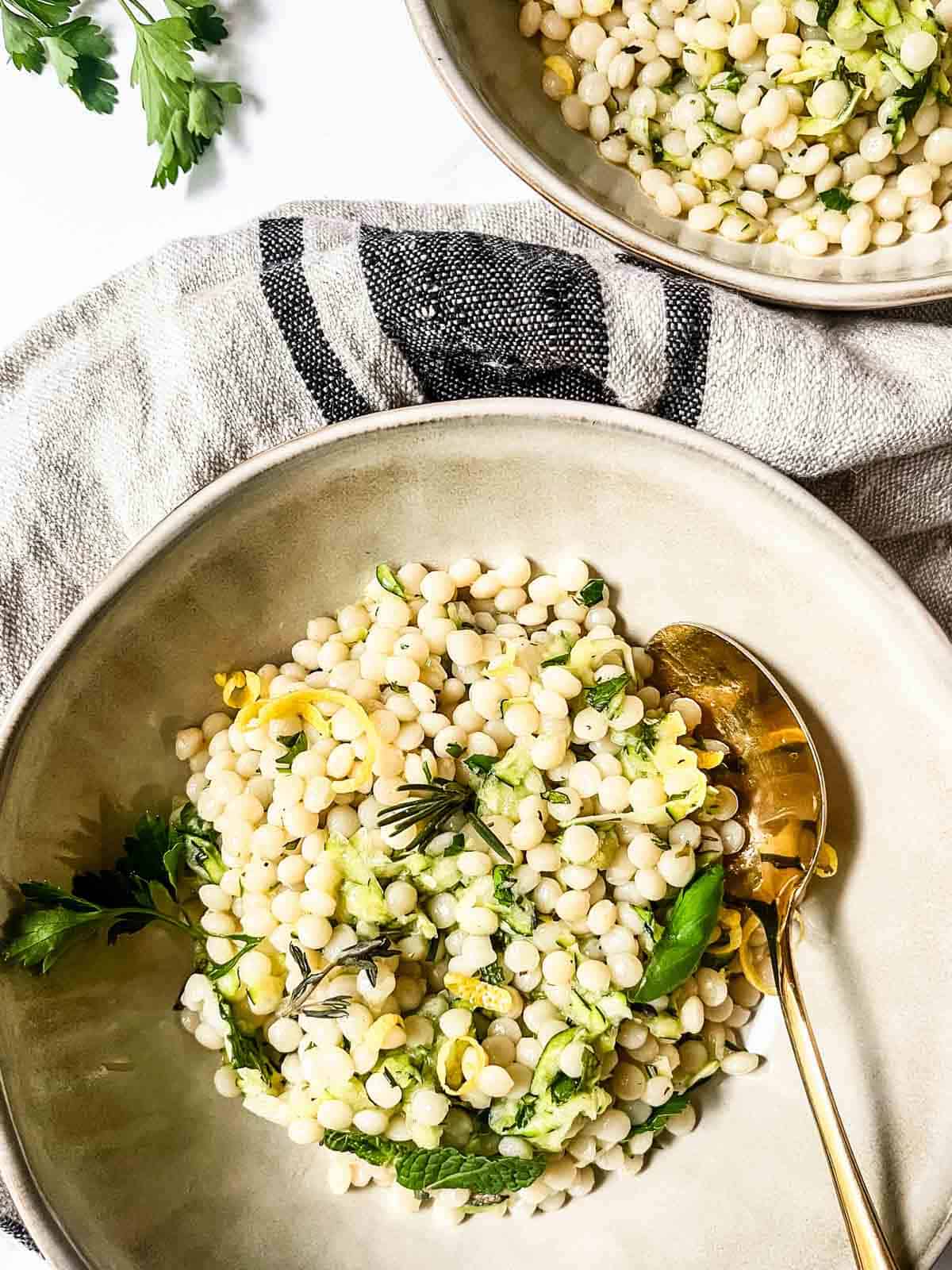Zucchini Couscous served in a bowl.
