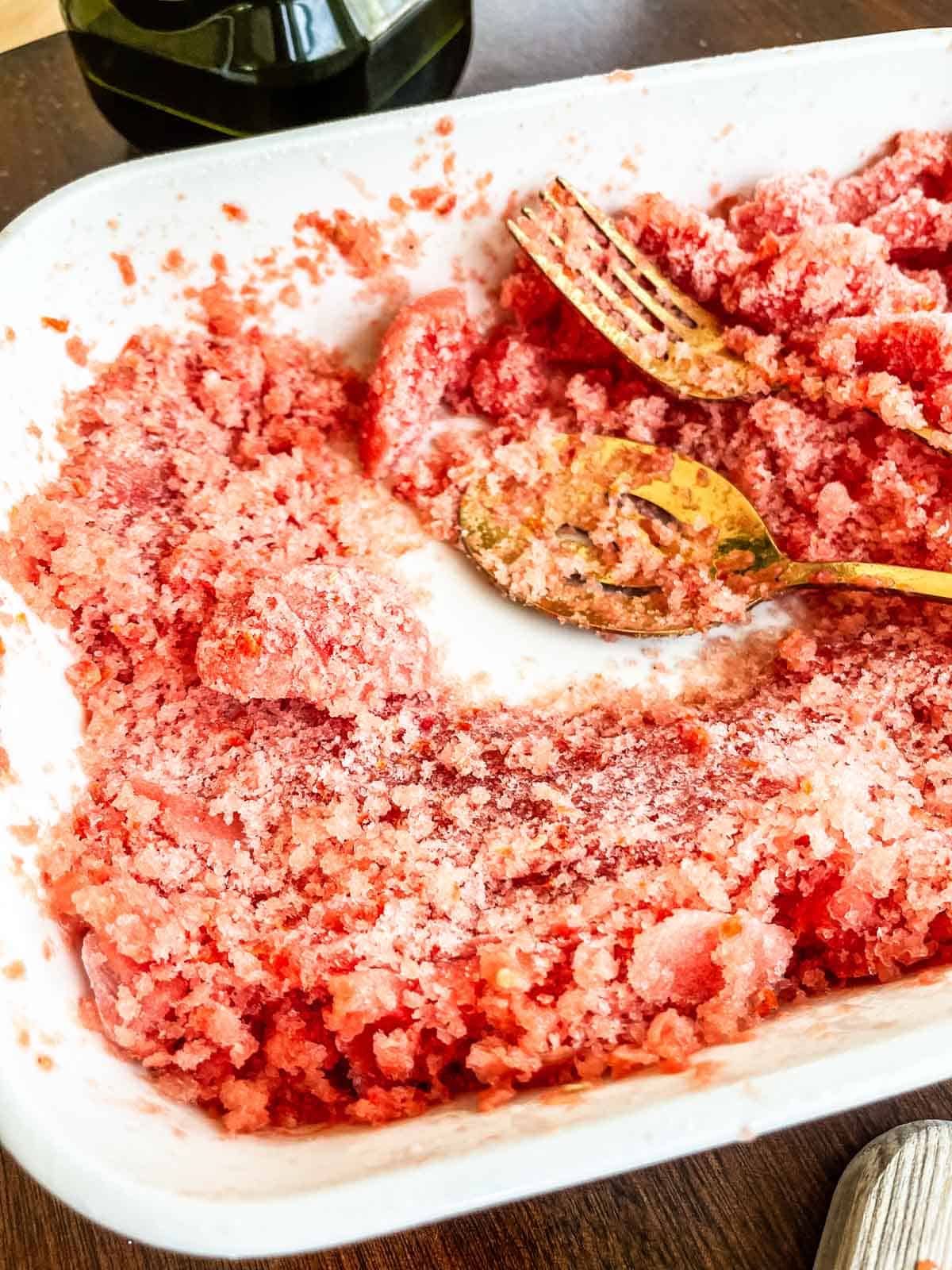 Tomato granita shaved in bowl. 