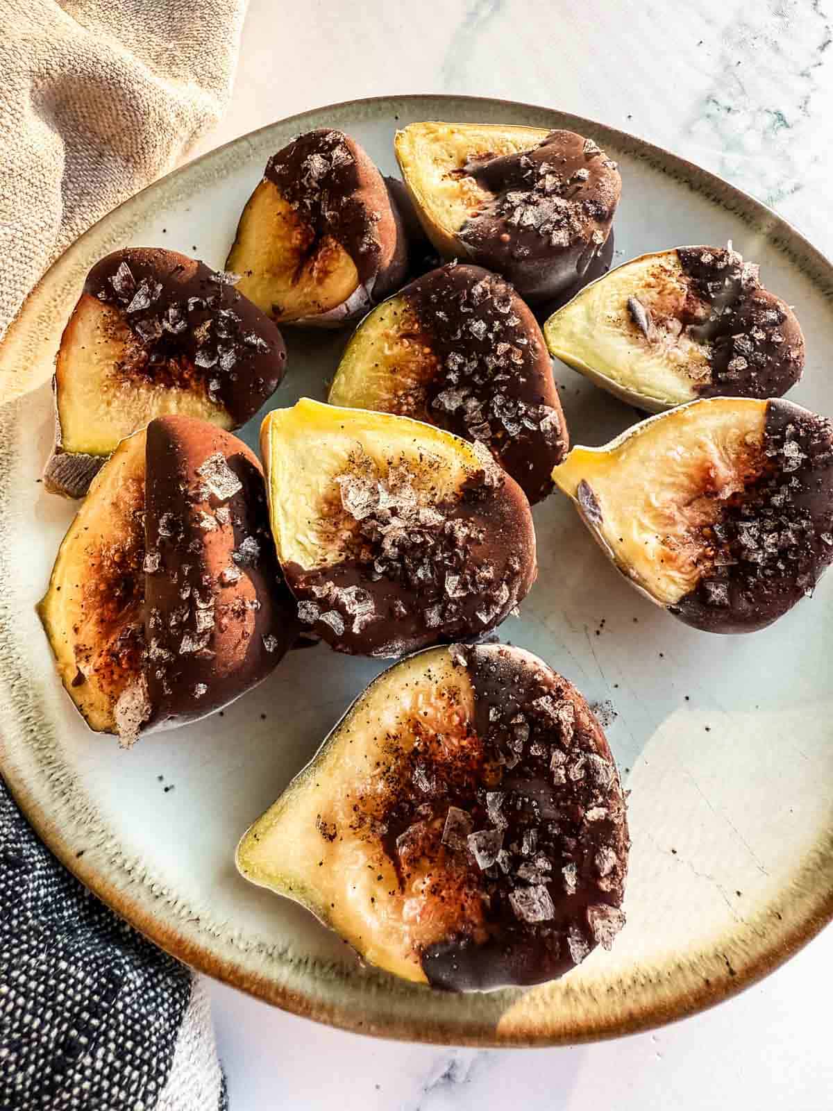 Chocolate Dipped Figs on a plate.